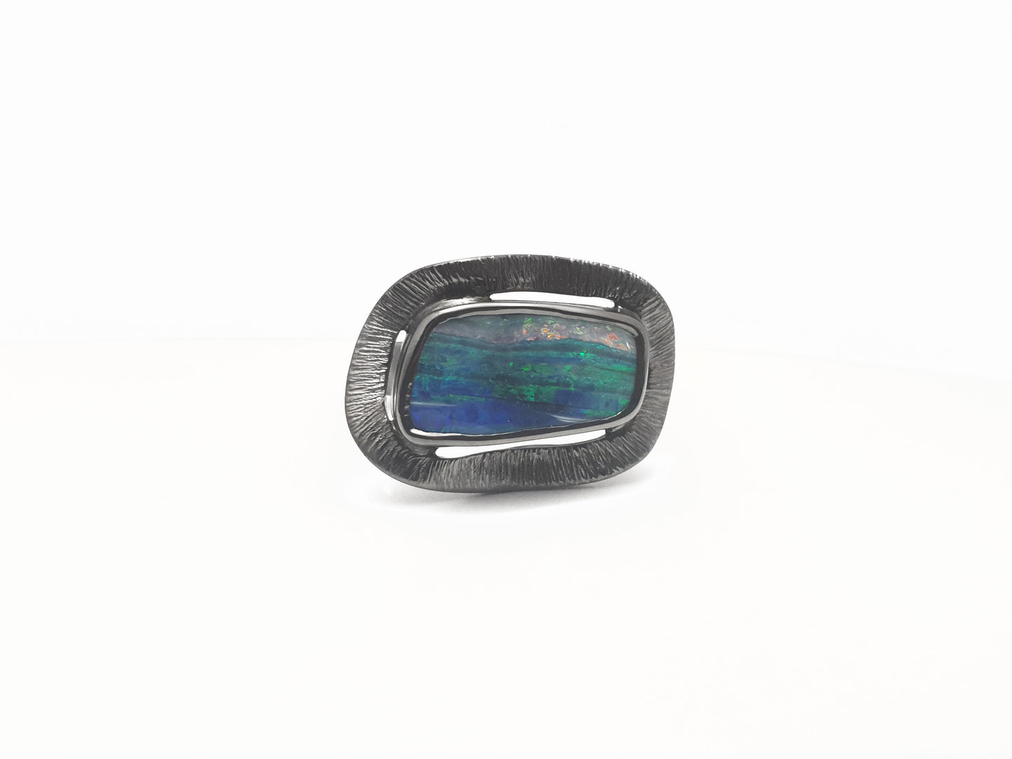 Deep blue and fresh green opal with strip of pink, set in a silver fringe style with a grey finish. Ethical jewellery handmade from local Queensland products. Australian designed and Australian made