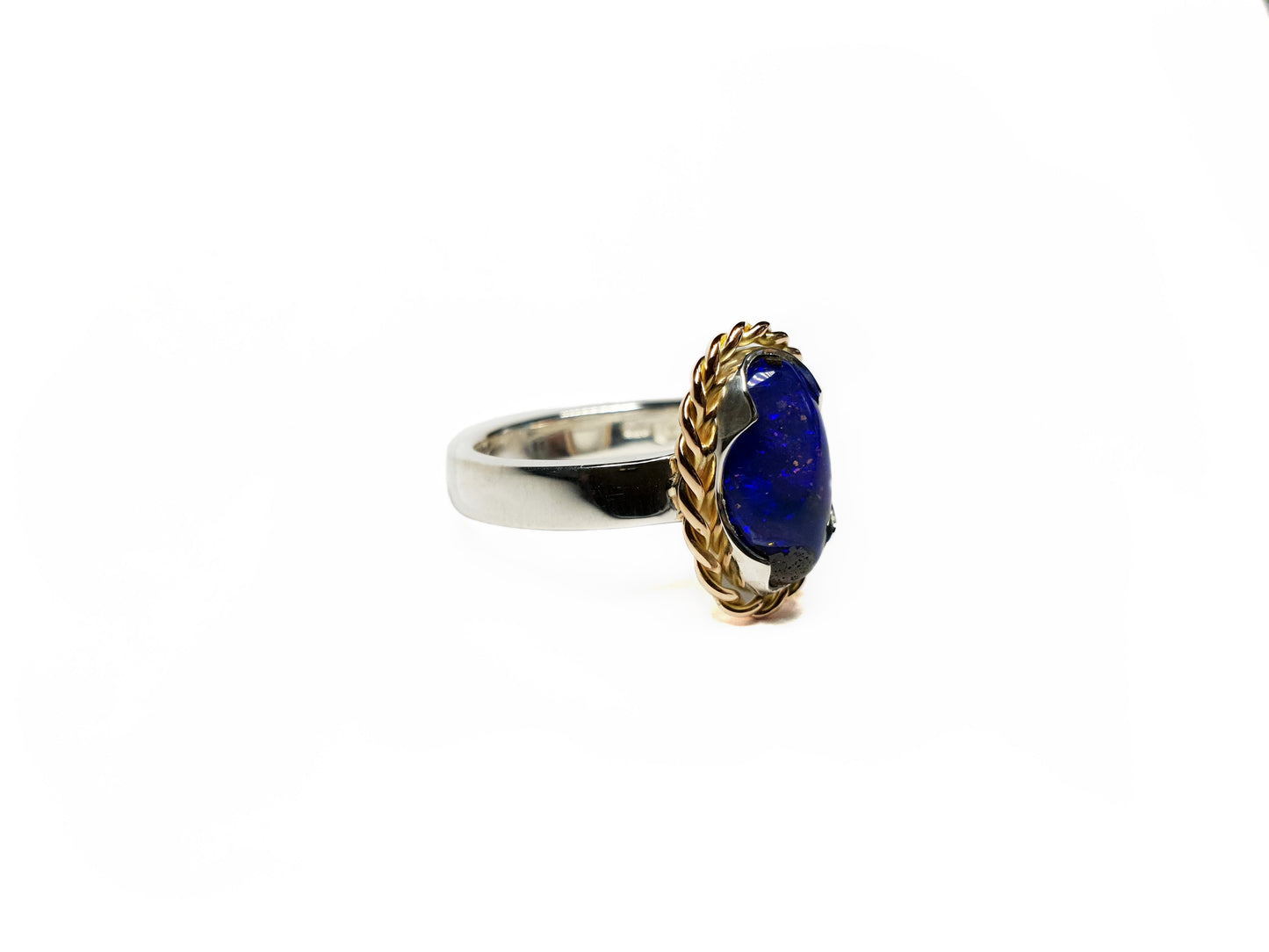 9ct rose gold twist and silver band with a blue Queensland Boulder Opal. Australian made and handcrafted using local and ethical products.