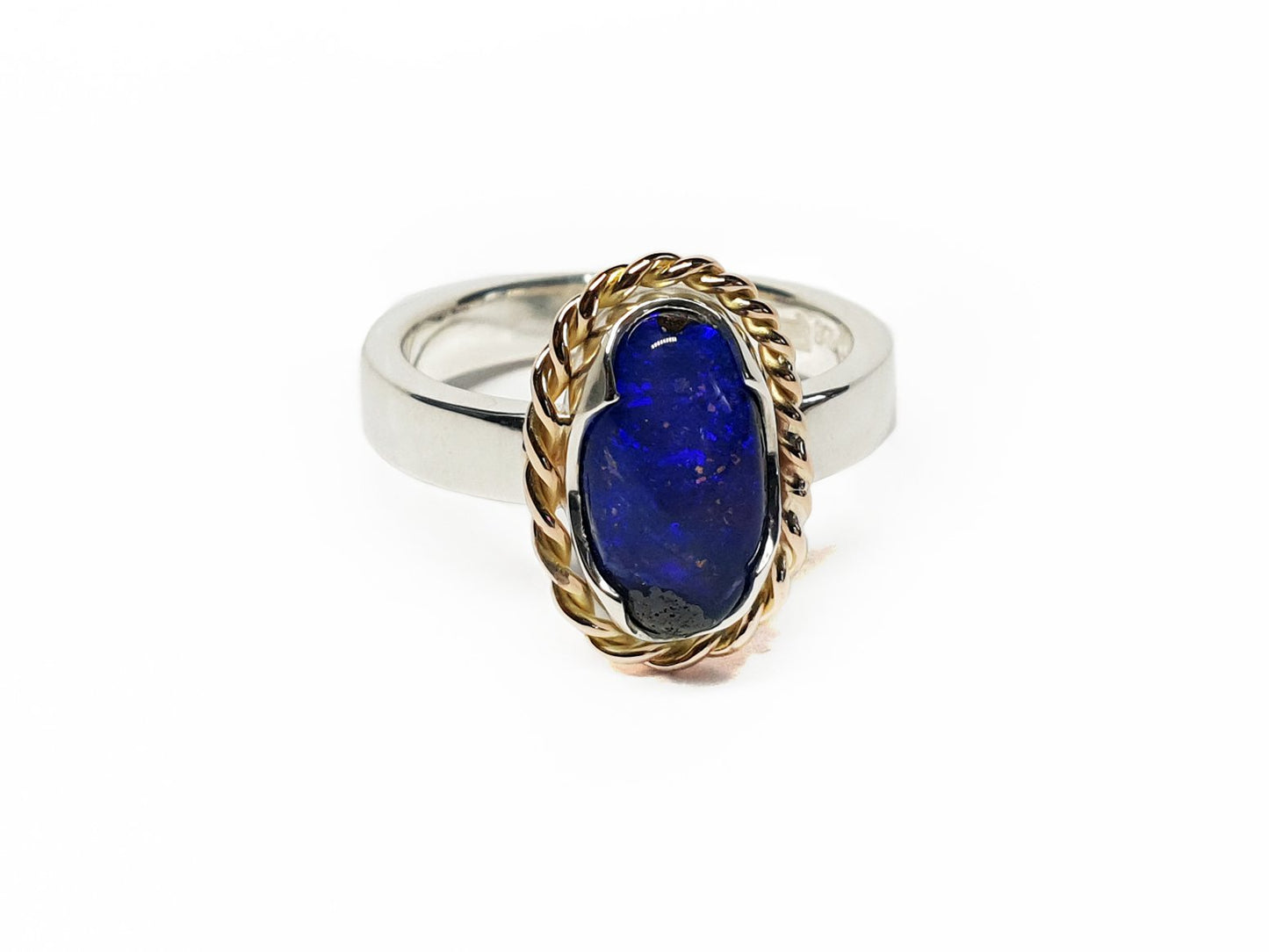 9ct rose gold twist and silver band with a blue Queensland Boulder Opal. Australian made and handcrafted using local and ethical products.