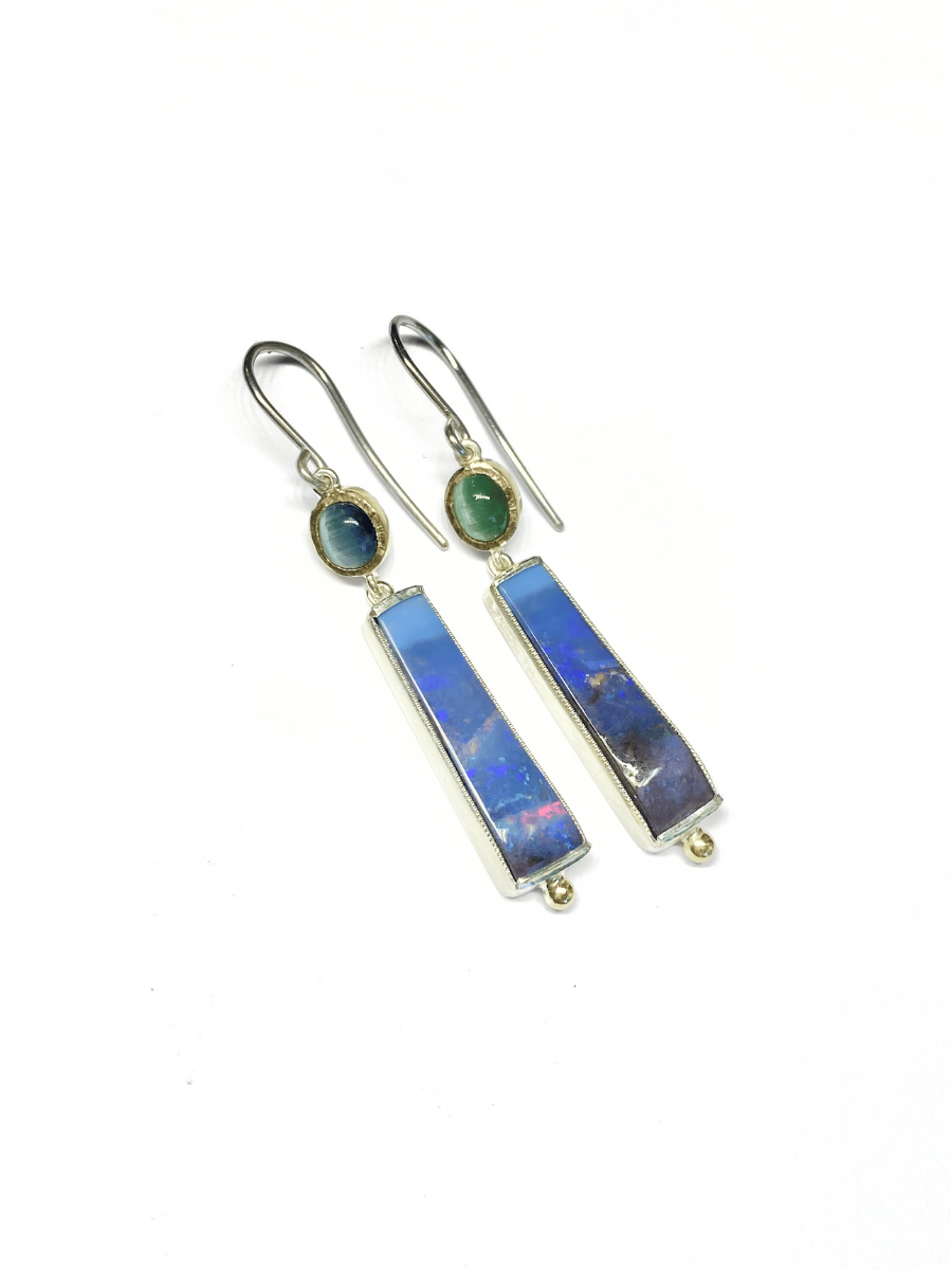 pair of earrings with green tourmaline and blue boulder opal set in yellow gold and silver