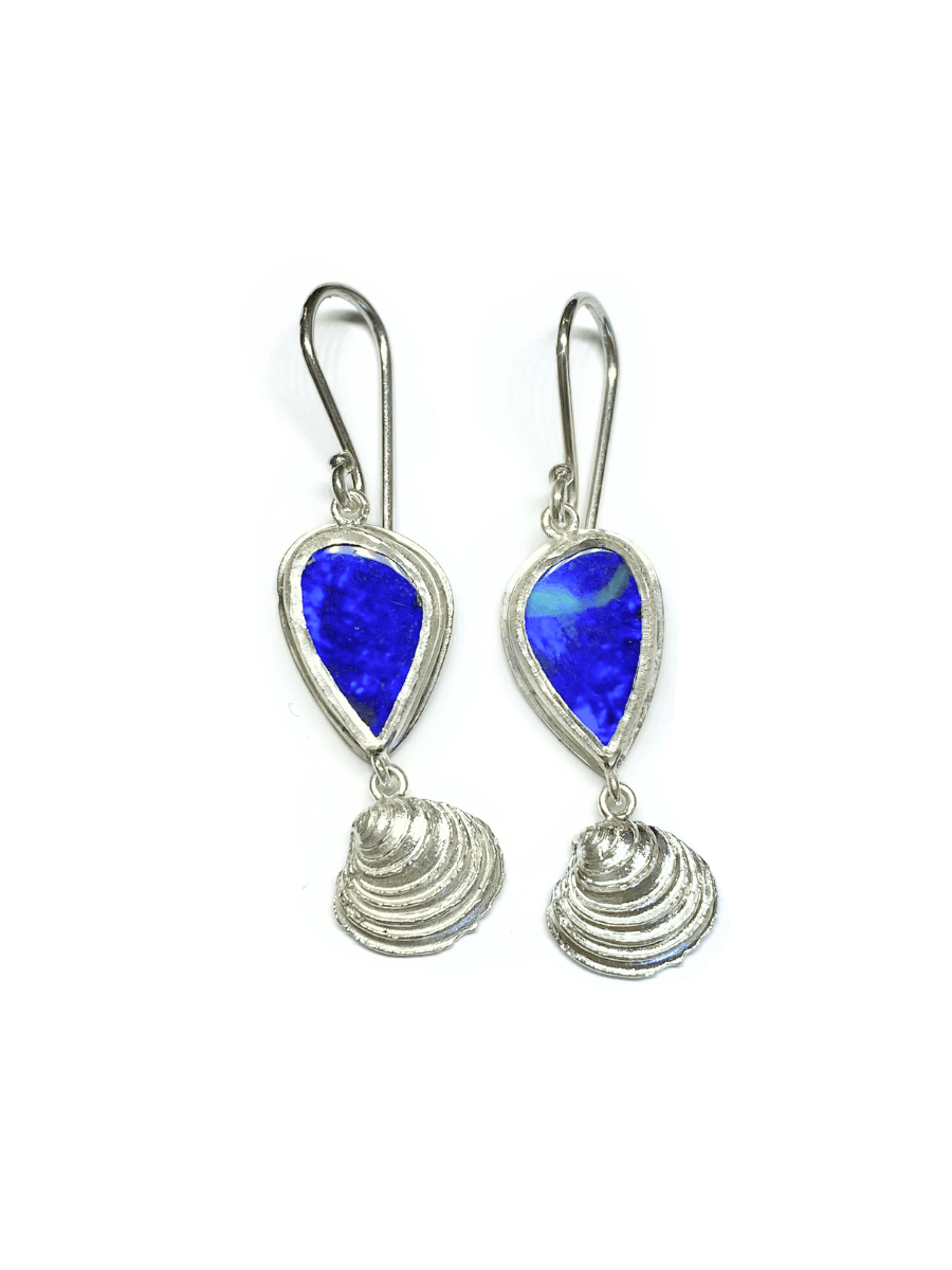 Pair of earrings with blue teardrop-shaped vivid blue opals and silver shell designs. Handmade design and ethically sourced gems. Made in Brisbane, Australia