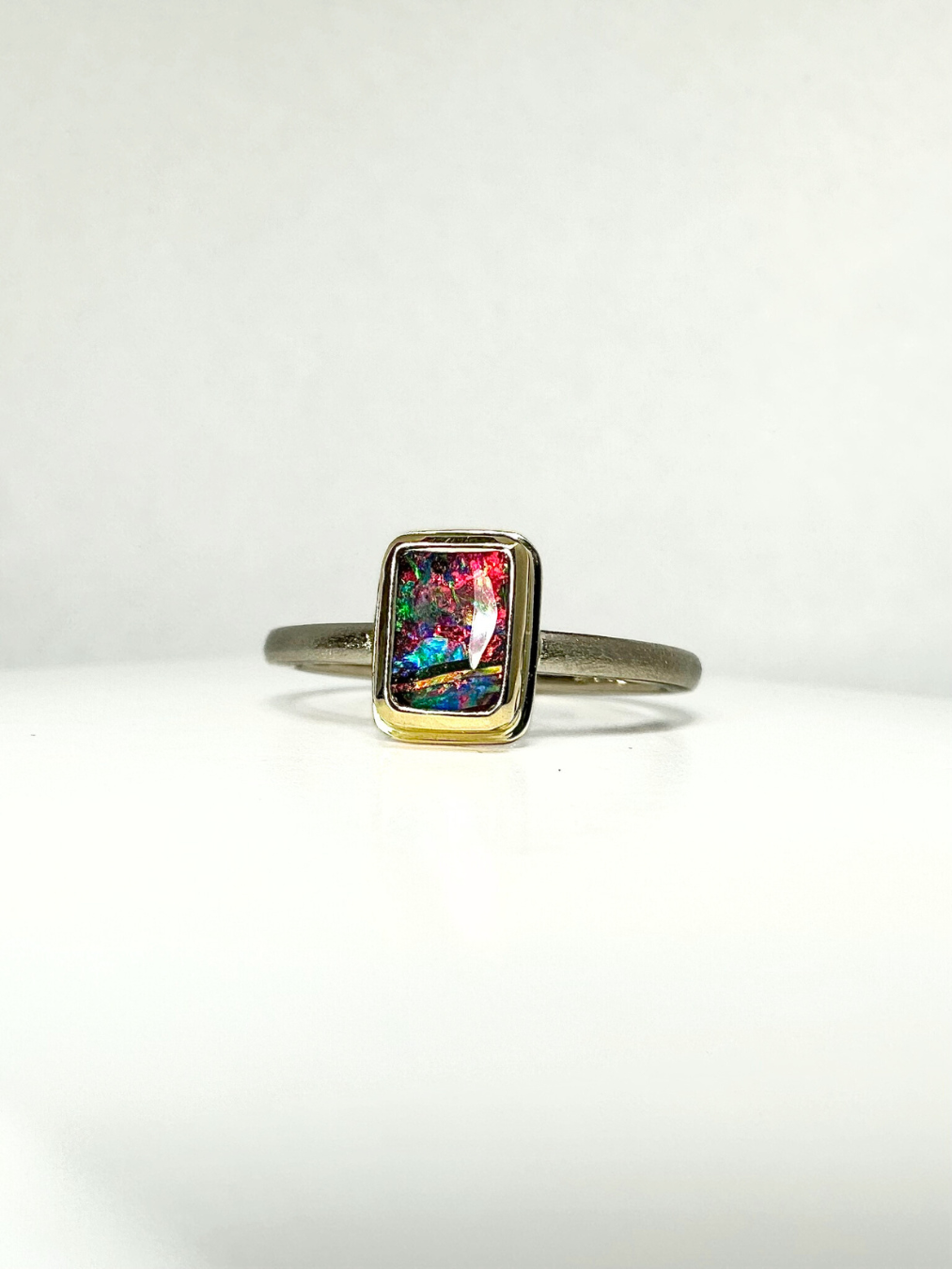 Rainbow Blaze Boulder Opal Ring