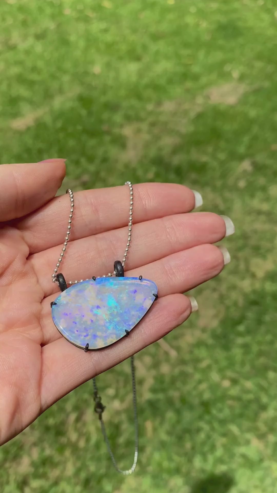 purple lightning ridge boulder opal pendant with blackened silver Glasshouse Mountains
