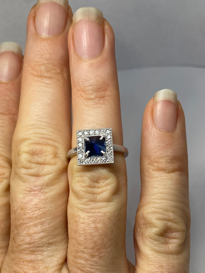 Inverted and Blue Sapphire and Diamond Ring