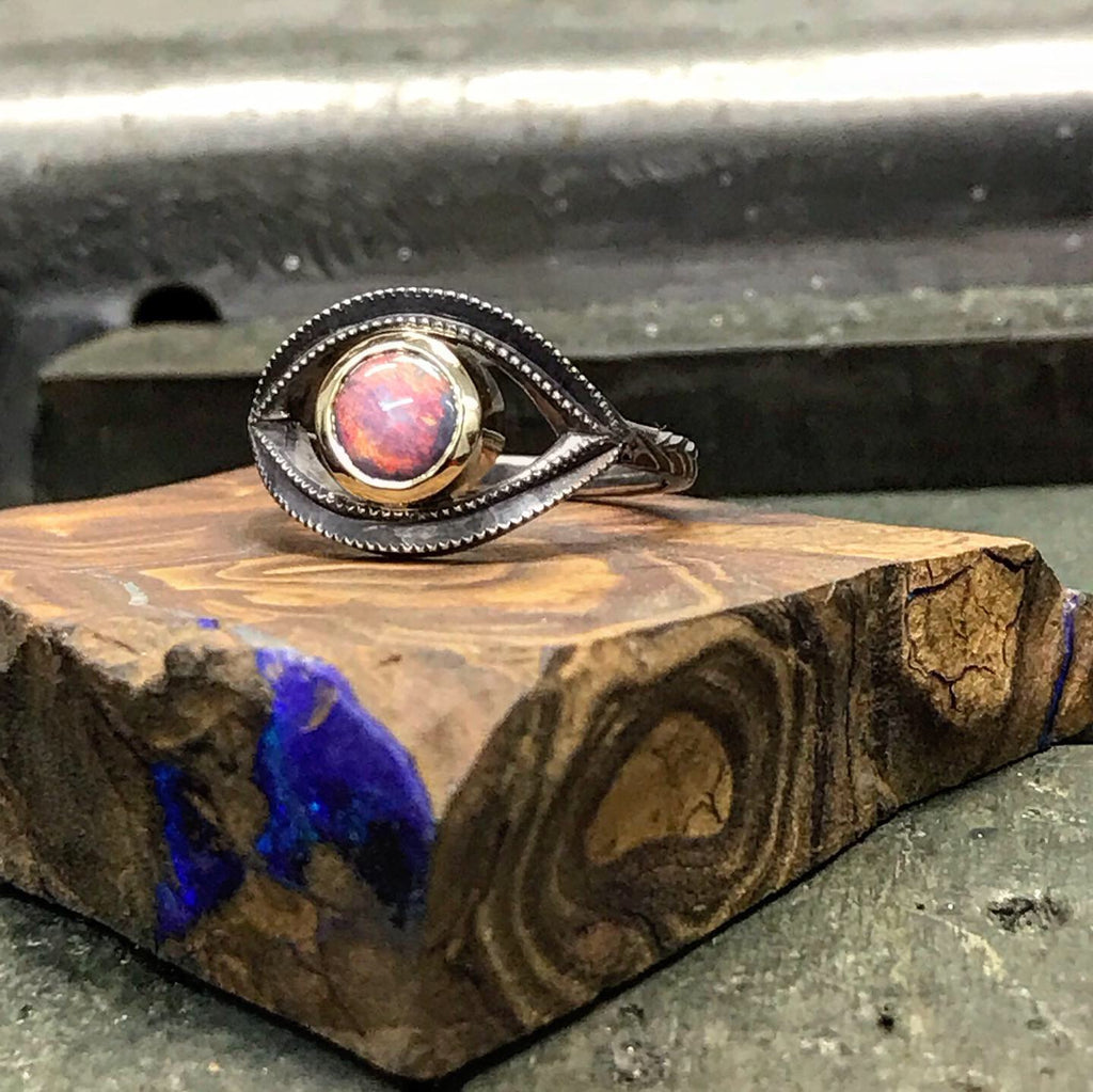 Mystical, Alternate, Gothic ring with pink and purple Queensland Boulder Opal set in blackened Silver in the shape of a mystical eye. This unique ring is handcrafted and Australian designed and made for a high quality finish. We believe in fine, high quality jewellery and use only ethically sourced materials