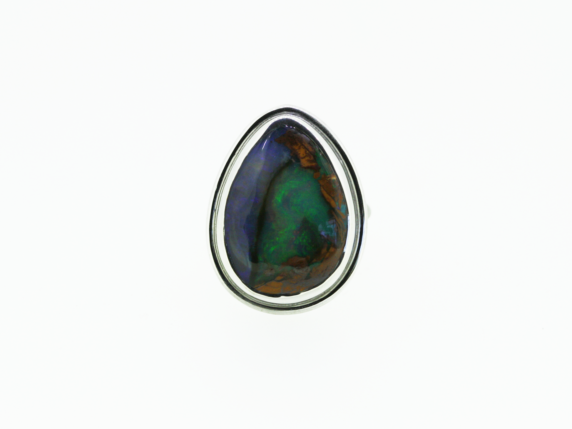 Queensland Boulder opal set in silver bezel with twisted band. Large green and red opal. Hand crafted in Brisbane studio using ethically sourced materials. Australian made sparkling opal ring. 