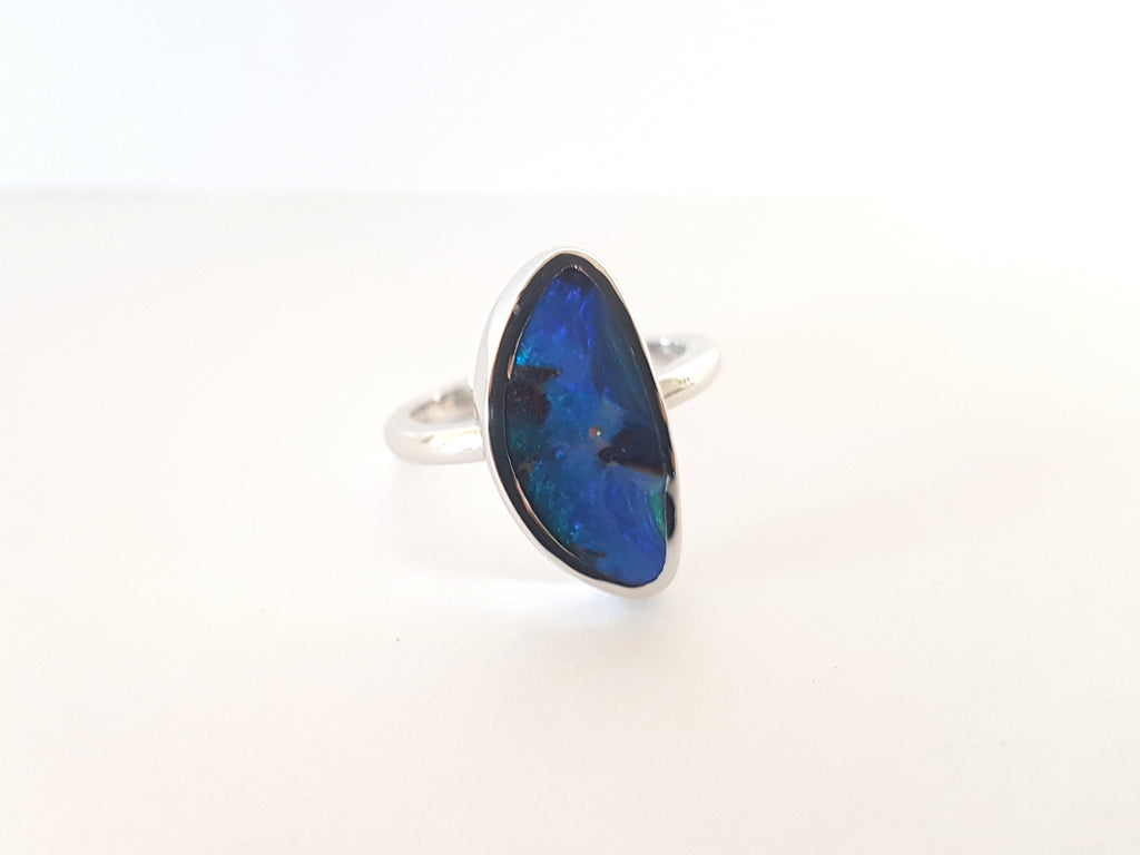 Blue Queensland Boulder Opal set in polished silver band. This ring is Australian made and handcrafted in our Brisbane studio using ethically sourced materials