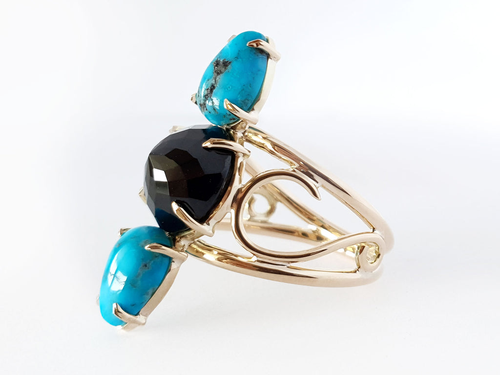 Bright turquoise and black Australian Spinel ring. Australian Made and hand crafted in our Brisbane studio using ethically sourced materials. Hand made for a high quality finish 