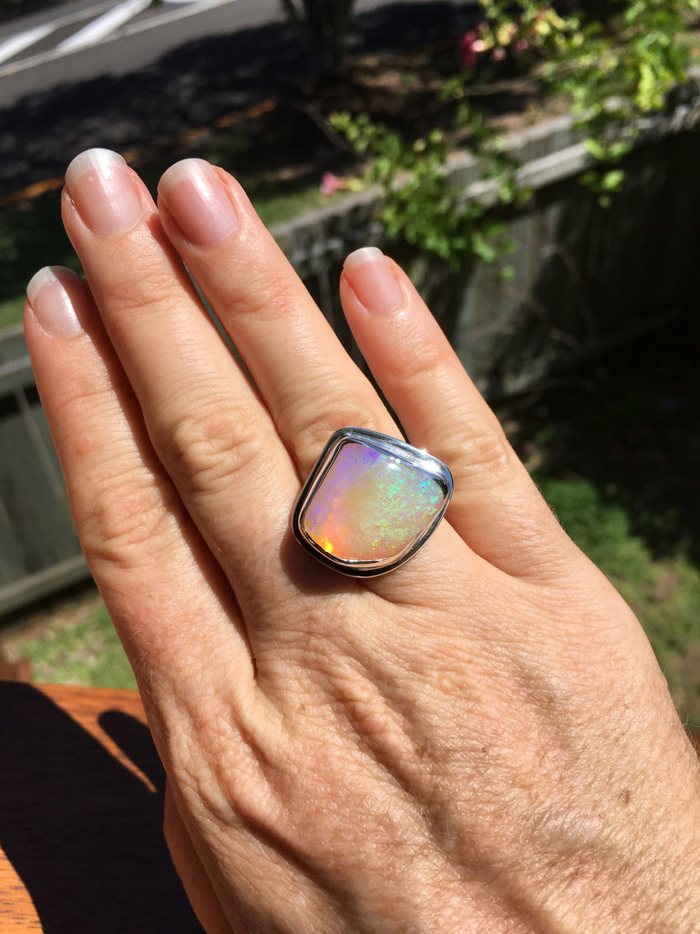 Crystal Opal and Silver Ring On Hand